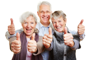 elders showing their thumbs up