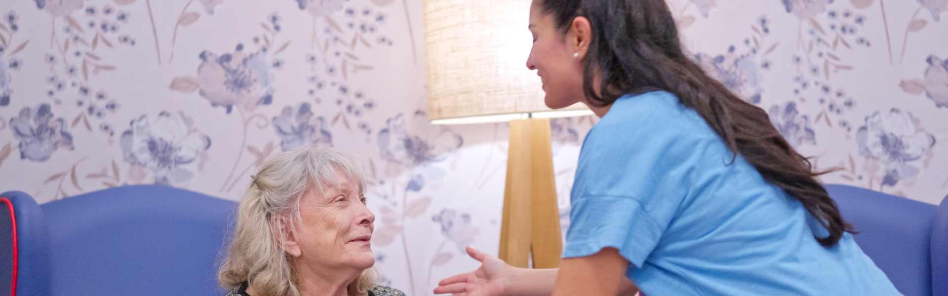 caregiver assist the old woman